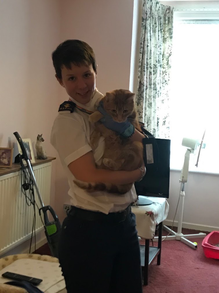 Harriet Daliday, RSPCA inspector, with a cat found alone after her owner had sadly passed away a week earlier RSPCA South London